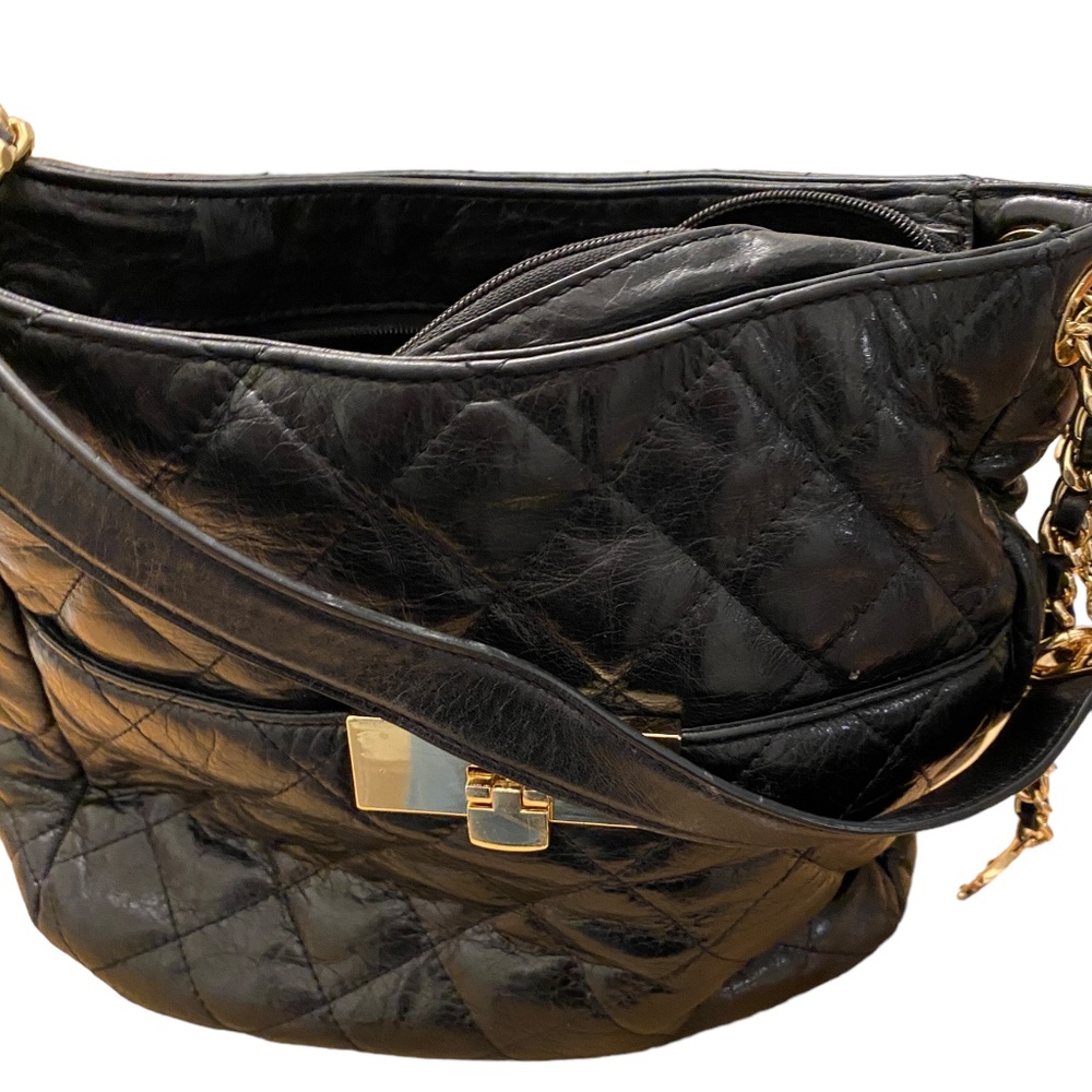 Authentic Michael Kors Lamb skin quilted handbag. - Picture 8 of 13